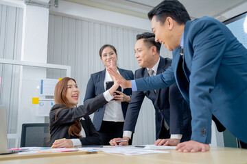 Office Conference Business Meeting Presentation: asian Business people group meeting Talks, Uses Wall TV to Show Company Growth with Big Data Analysis, Graphs, Charts, Infographics, e-Commerce Startup