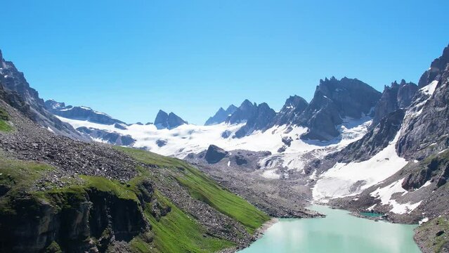 Aerial of Chitta Katha Lake, Neelum Valley of Azad Kashmir, Pakistan. It translates to "White Stream" in the local language, which aptly describes the crystal-clear waters of this enchanting lake.
