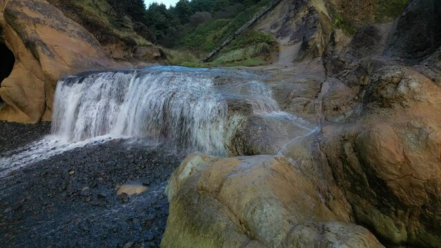 Close-up view of a cascade waterfall flowing down from rocks