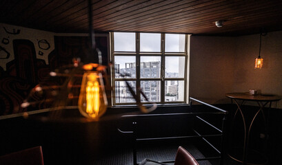 View of buildings in the city center of São Paulo through a window and bulb