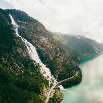 Aerial shot of the Langfossen waterfall in Norway.
