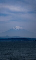 Fototapeta premium Scenic view of the sea against Fuji mountain in Japan