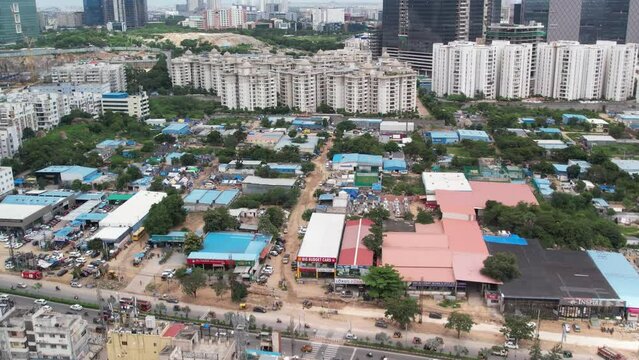 Aerial footage of the roads of the developing smart city shows less traffic. Khajaguda Lake Point and moving towards the Old Mumbai Highway, Rajiv Gandhi Nagar, Gachibowli.