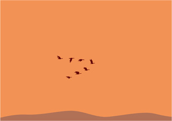 夕暮れの大地に数羽の渡り鳥が飛んでいるイラスト