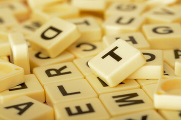 Scrabble letters in an educational context can make learning the ABCs more engaging and interactive for young students.