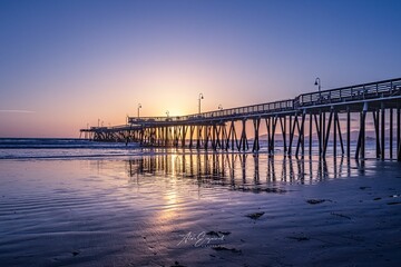 Obraz premium The pier at sunset, Beautiful beach