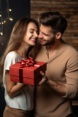 Fototapeta na wymiar Boyfriend presenting a gift to a girlfriend when she close her eyes