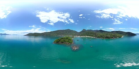 Big Island in Angra dos Reis surrounded by a tranquil blue ocean, Brazil