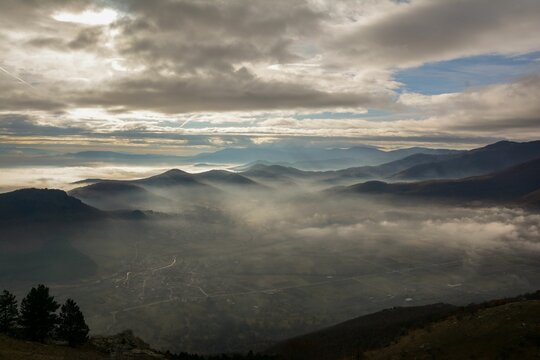 clouds over the mountains on a cloudy day in the afternoon