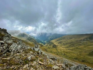 Beautiful view of Fagaras mountains on a cloudy day. Romania.