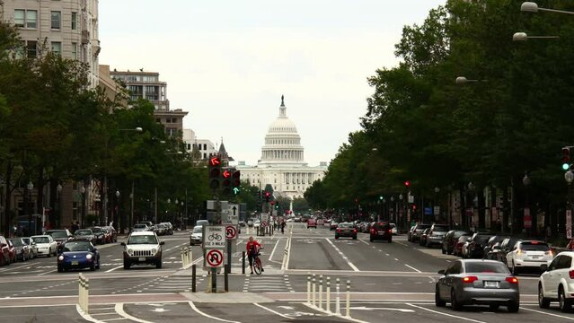 Looking down Pennsylvania Avenue towards the Capitol building in Washington D.C. Shot in Timelapse, zooming in slowly. Rendered in UltraHD 4K from high resolution stills.