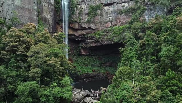 Belmore Waterfall Drone Footage surrounded by natural bush and mountains.