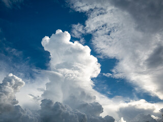 Blue sky fluffy white clouds on summer season bright clear skyline with beautiful cloudscape. Panorama blue sky clouds pattern on daylight with copy space. Cumulus cloudscape air climate sunny day