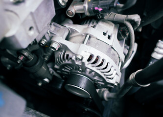 Car alternator or generator in a car engine compartment , Car parts concept