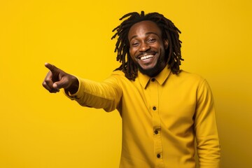 Happy young man with dreadlocks