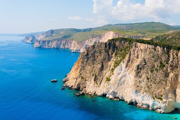 Stock photo depicts an aerial view of the Zakynthos coastline featuring a picturesque clifftop