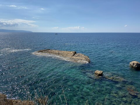 Aerial view of sea with ricky beach