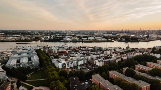 timelapse with vertical movement of the port of hamburg, germany, europe, from Hauptkirche St. Michaelis, St. Michaelis church, showing the norderelbe river