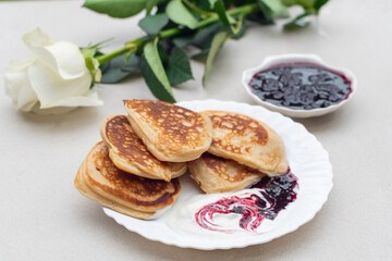 A delicious platter of pancakes decorated with flower