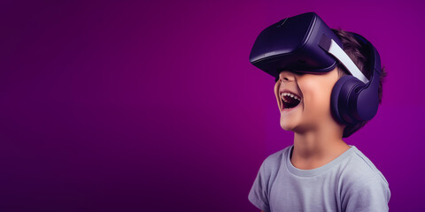 Young boy getting experience using VR headset glasses isolated on a purple background with copy space