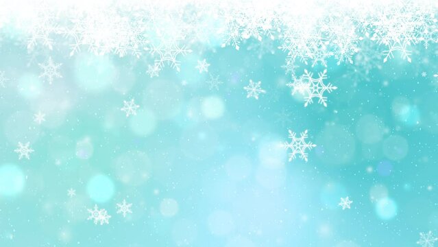 Light blue Christmas background with snowflakes.
