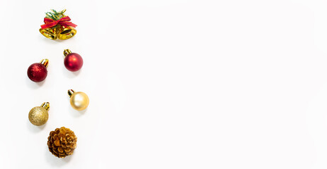 Minimal creative flat lay of christmas and new year holiday season. Top view winter christmas decorations on white background with blank space for text photography.