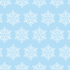 Snowflakes pattern. Seamless pattern with the image of white snowflakes on a blue background. Winter Christmas pattern. Vector illustration