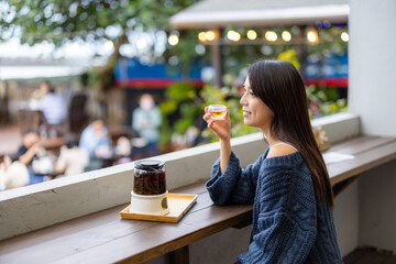 Woman drink of tea at coffee shop