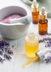 Fototapeta na wymiar Lavender salt, natural essential oil and fresh lavender