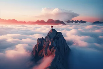 Foto op Plexiglas a single man stands on top of a mountain overlooking clouds © Kien