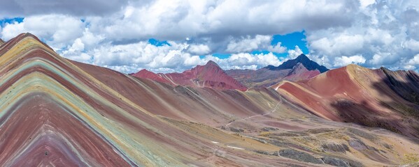 Landscape shot of the beautiful and colorful Rainbow Mountains in Peru