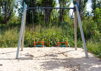 Swings on the playground in the yard
