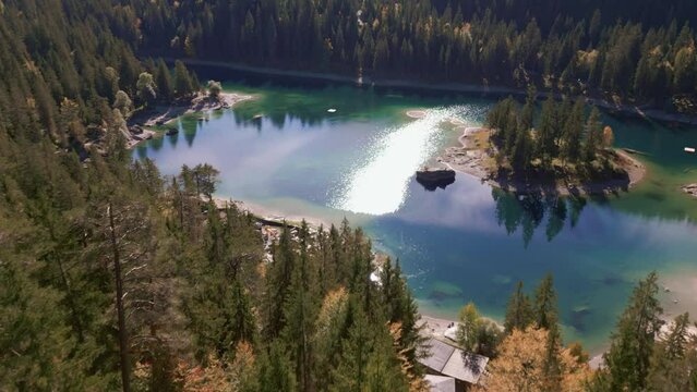 Aerial shot of Lake Caumesee in Grisons Switzerland. The lake doesn't have much water left in fall