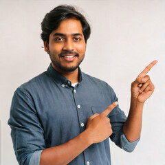 Portrait of an Indian man wearing formal outfit pointing finger up