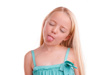 Calm, tongue out and happy girl with modern fashion and kids clothing with confidence. Young kid, youth clothes and child from Sweden with joy and dress isolated on a transparent, png background