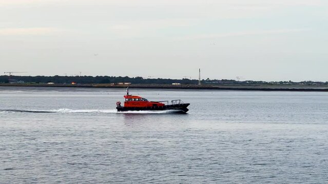 Seafaring Serenity: Handheld Following Shot of DPC Tolka Leaving Dublin Port in the Evening