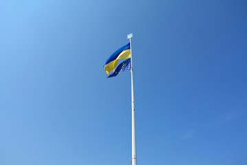 Eu Flag Ukraine Flag Together on Blue Sky Background.Cooperation.