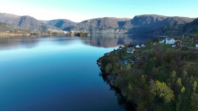 Stavenes in Vaksdal Norway, aerial revealing Sorfjorden sea at sunny day