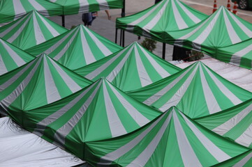 Canvas tents are set up outdoors , Flea market tents in Thailand