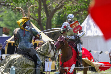 Knight jousting. Medieval knights during a jousting tournament