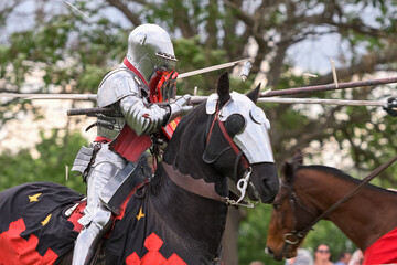 Knight jousting. Medieval knights during a jousting tournament