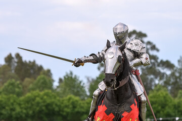 Knight jousting. Medieval knights during a jousting tournament