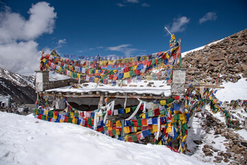 The beautiful views of Colorful Tibetan prayer flags on Khardung La or Khardung Pass