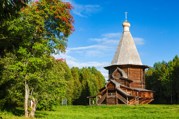 The ancient wooden St. George Church of the 17th century in the Malye Korely Museum of Wooden...