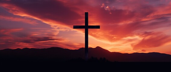 Fototapeta na wymiar Silhouette of a cross on against a colorful sunset sky