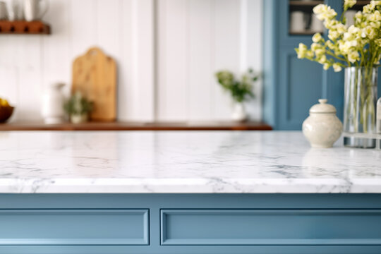 Closeup of white marble countertop in modern blue kitchen with vase of flowers. High quality photo
