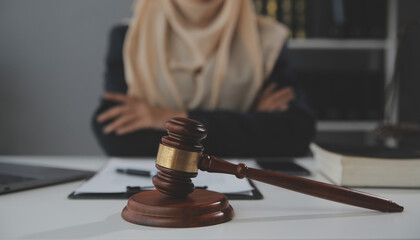 Business and lawyers discussing contract papers with brass scale on desk in office. Law, legal...