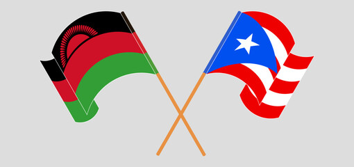 Crossed and waving flags of Malawi and Puerto Rico