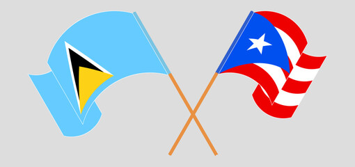 Crossed and waving flags of Lesotho and Puerto Rico