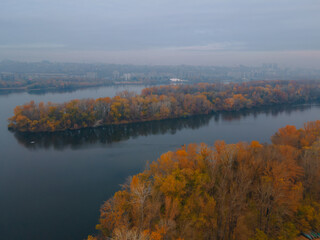 The rowing canal spit on Pobeda in the city of Dnieper from above. River View. Autumn colors. Drone photography.